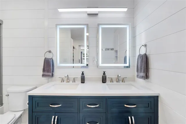 a view of a swimming pool with chairs