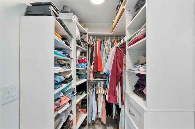 a swimming pool with outdoor seating and yard