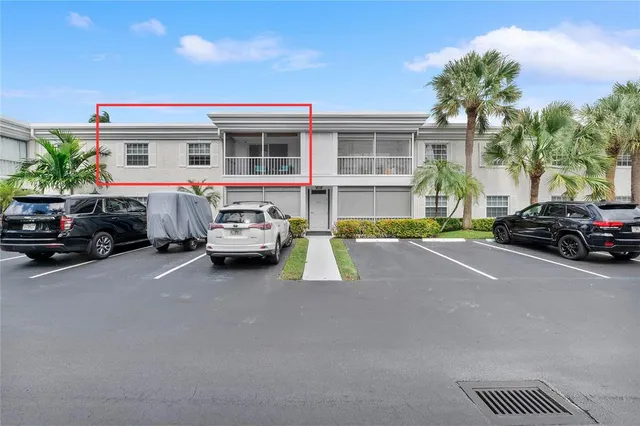 an aerial view of a house with a lake view