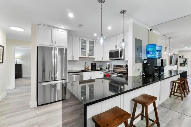 a view of a dining room with furniture