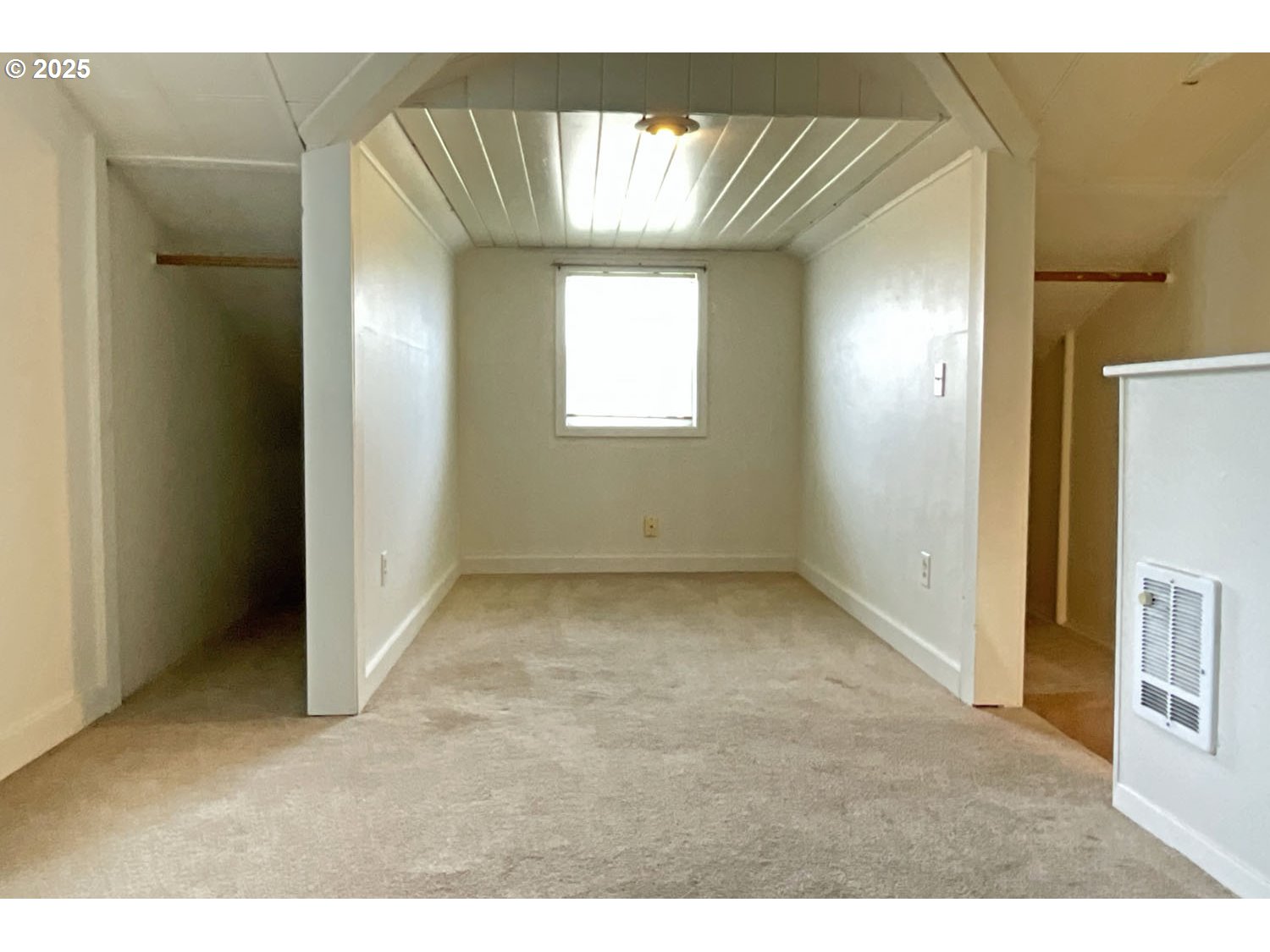 2775 Hilyard Street Eugene, OR 97405 - Photo 13 of 27 a view of an empty room with a window