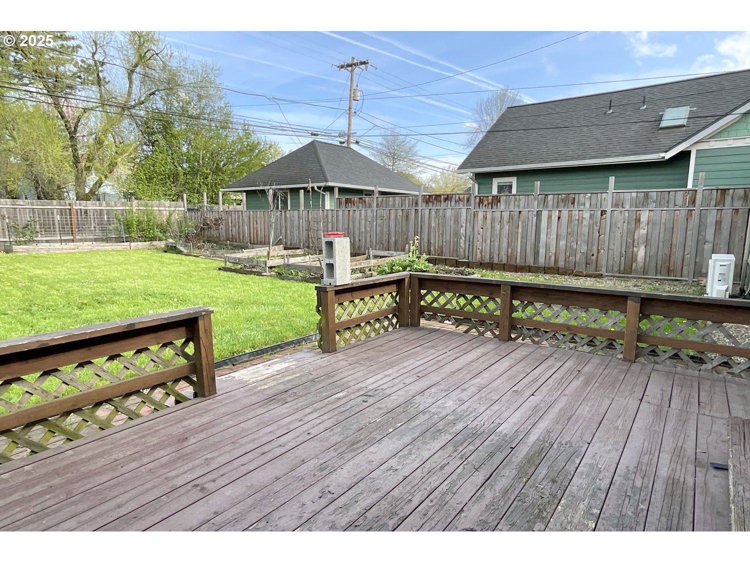 2775 Hilyard Street Eugene, OR 97405 - Photo 17 of 27 a view of a backyard with wooden floor