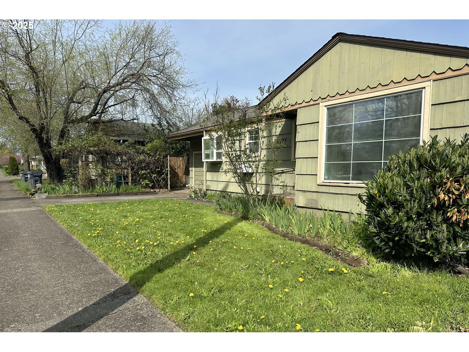 2775 Hilyard Street Eugene, OR 97405 - Photo 24 of 27 a view of a house with a yard