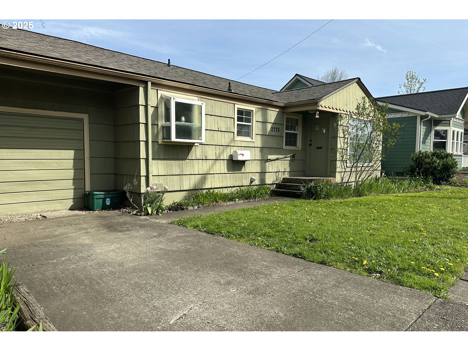 2775 Hilyard Street Eugene, OR 97405 - Photo 25 of 27 a front view of a house with a yard