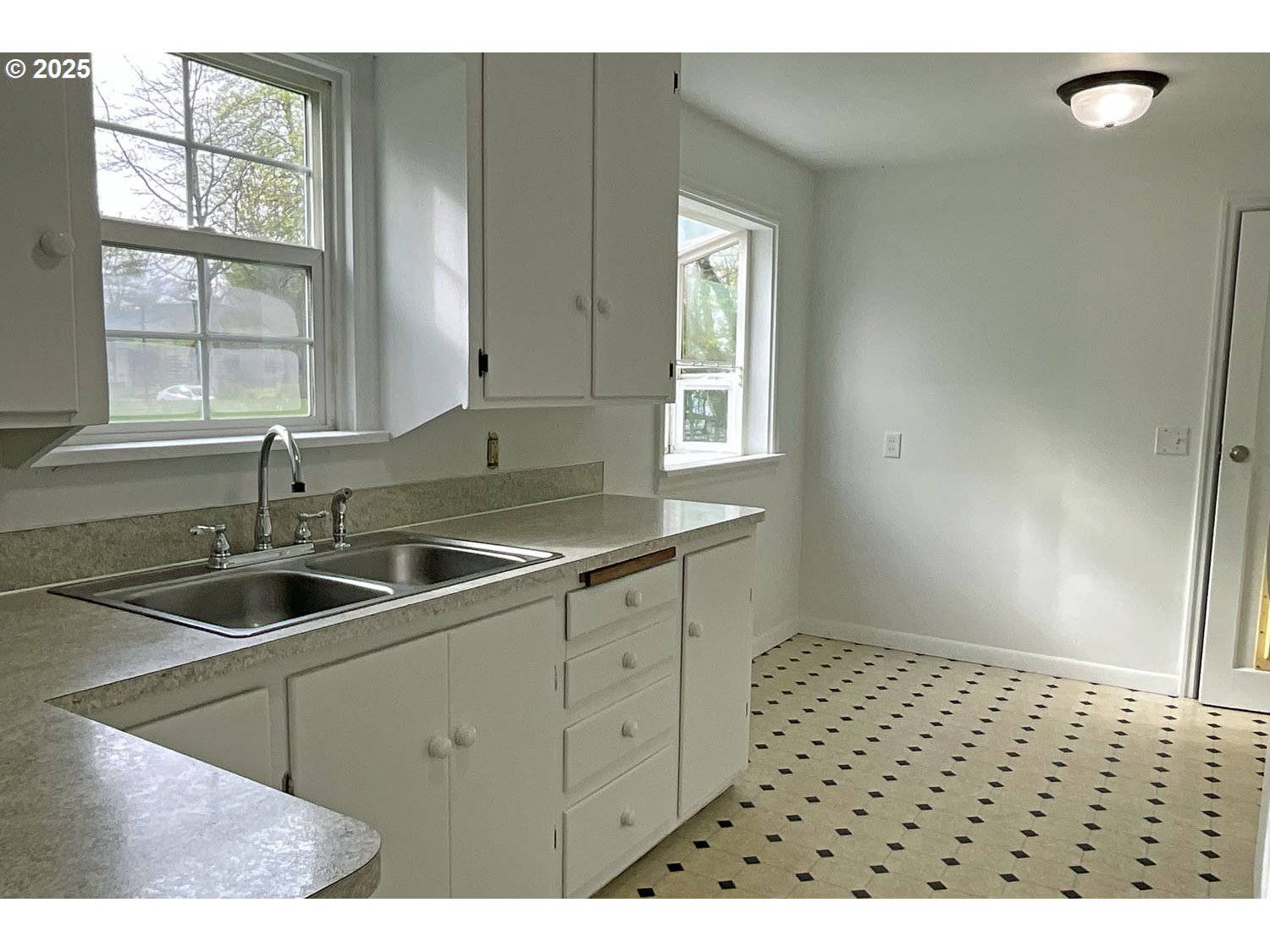 2775 Hilyard Street Eugene, OR 97405 - Photo 5 of 27 a kitchen with sink and window