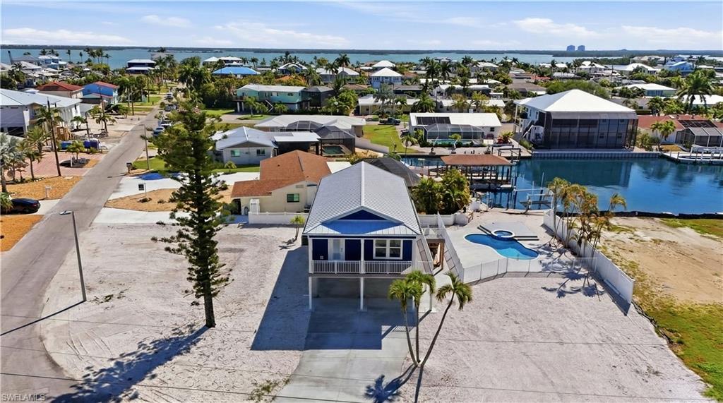 1 Fairview Boulevard Fort Myers Beach, FL 33931 - Photo 33 of 48 an aerial view of a house with a swimming pool