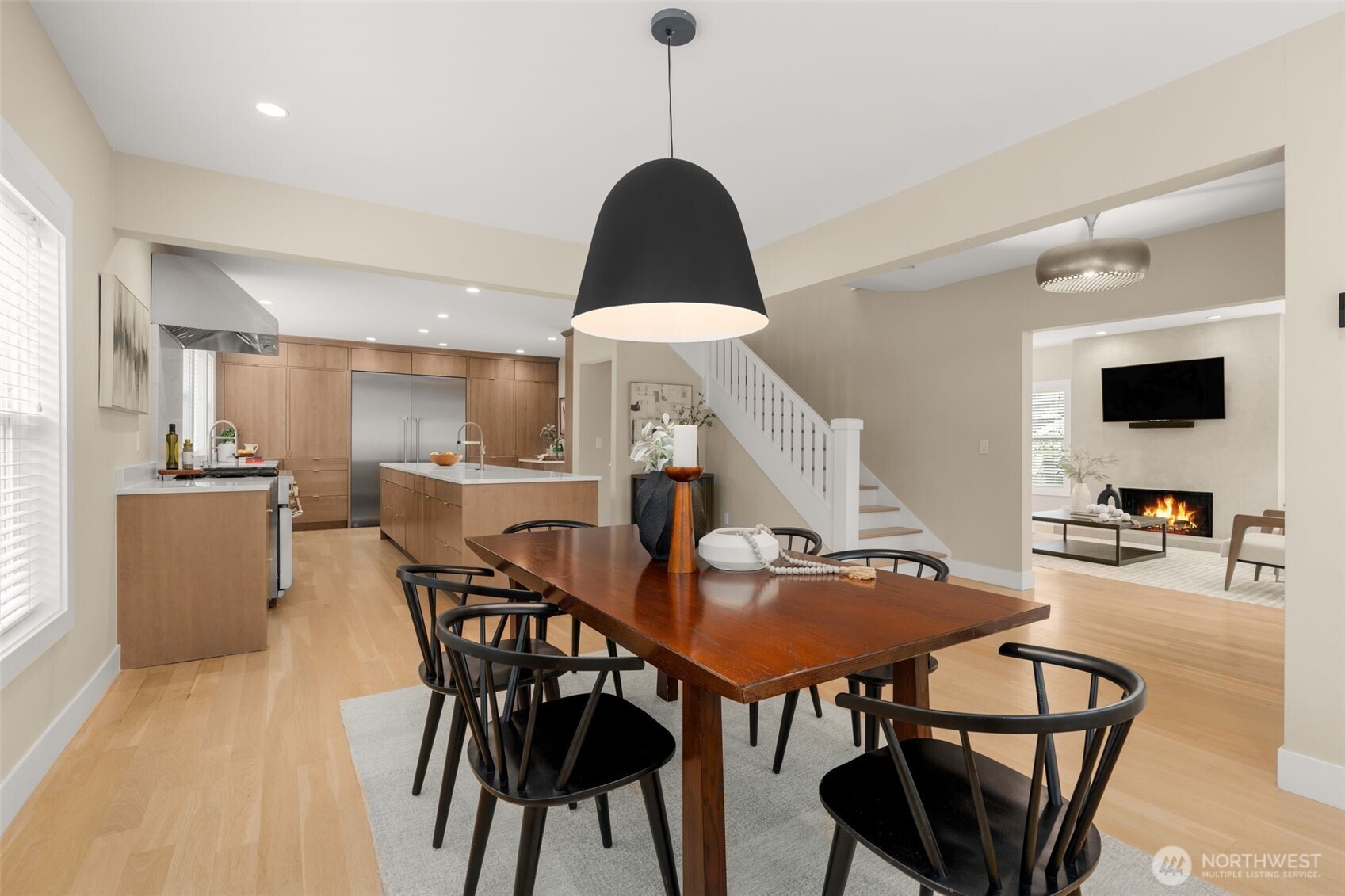 170 Lynn Street Seattle, WA 98109 - Photo 9 of 40 a dining room with furniture and wooden floor