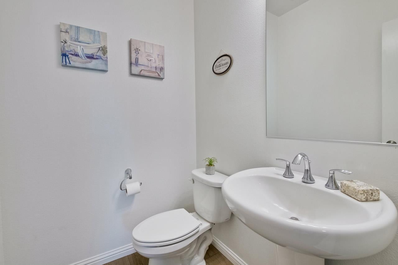6656 Stealth Loop San Jose, CA 95119 - Photo 19 of 50 a bathroom with a sink and a toilet