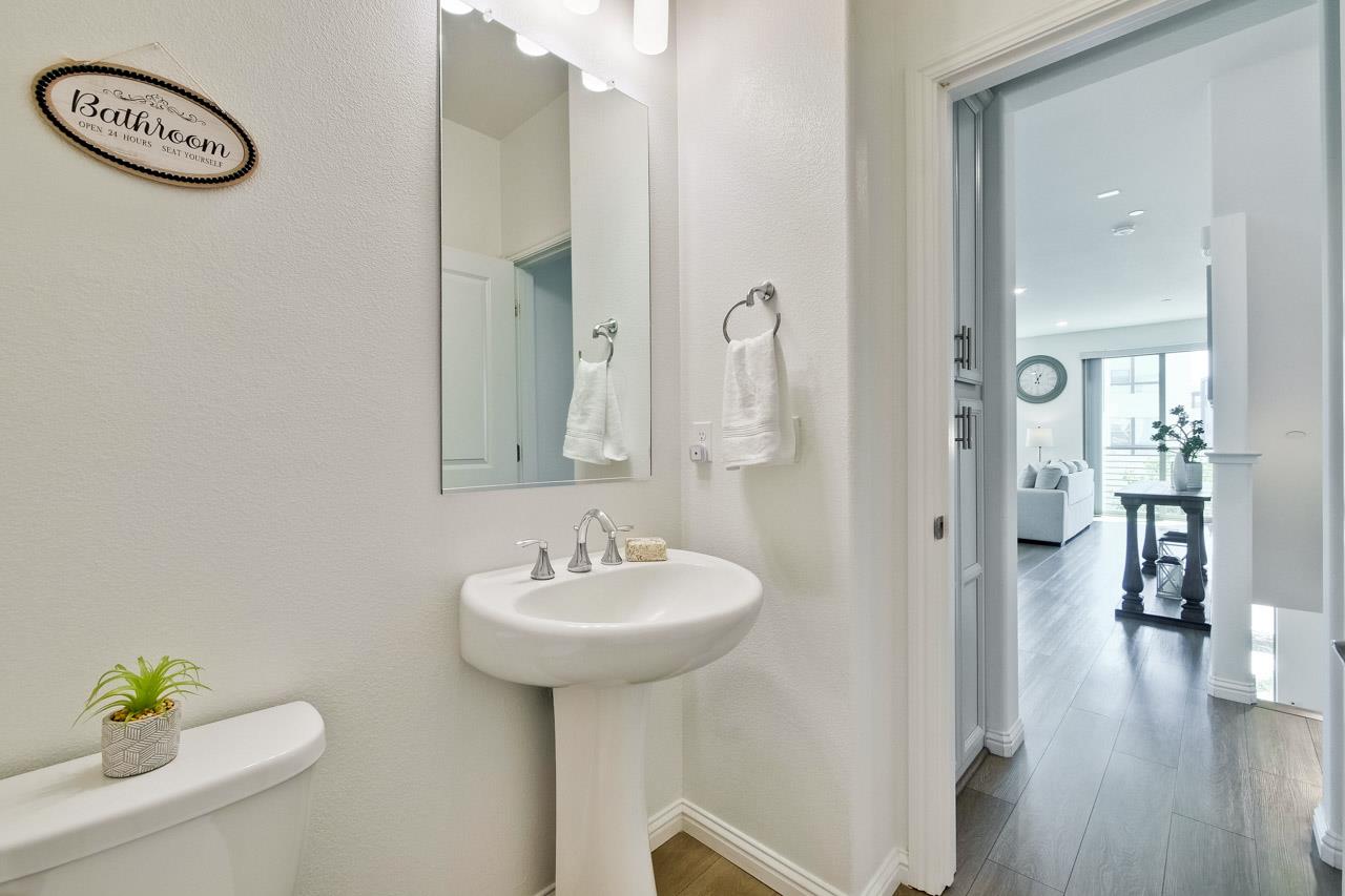 6656 Stealth Loop San Jose, CA 95119 - Photo 20 of 50 a bathroom with a sink and a mirror