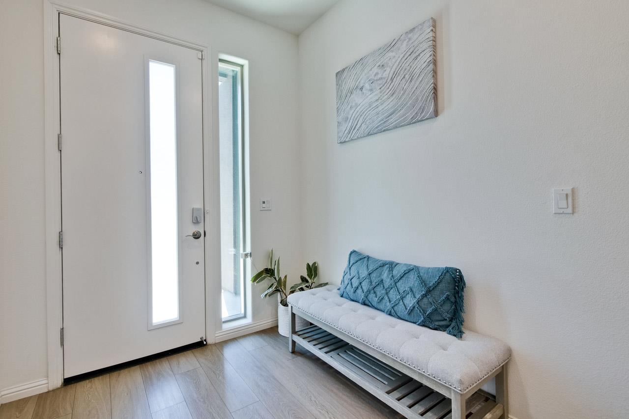 6656 Stealth Loop San Jose, CA 95119 - Photo 7 of 50 a living room with furniture and a window