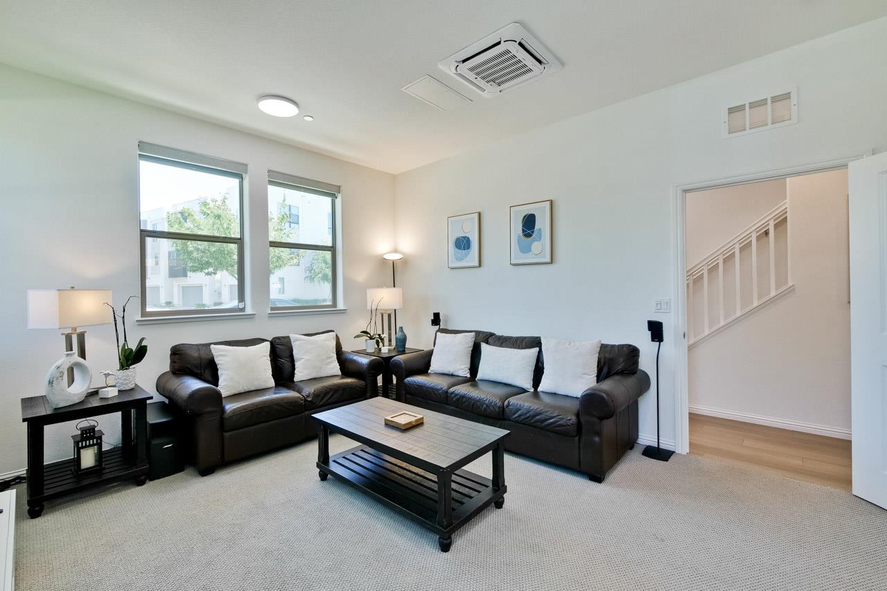 6656 Stealth Loop San Jose, CA 95119 - Photo 8 of 50 a living room with furniture and a window
