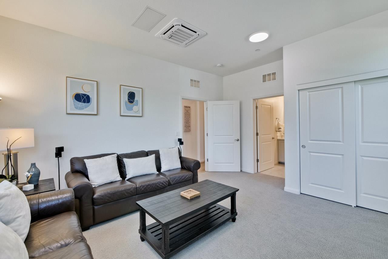 6656 Stealth Loop San Jose, CA 95119 - Photo 9 of 50 a living room with furniture and a table