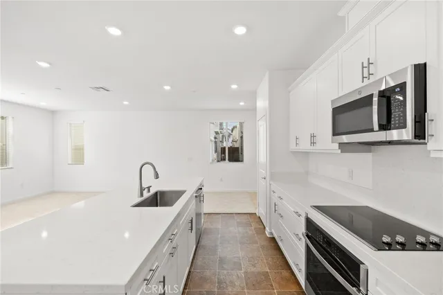 a bathroom with a sink and toilet