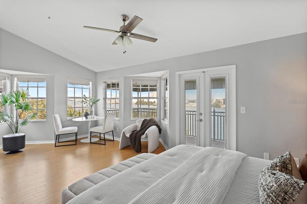 1450 Harbour Walk Road Tampa, FL 33602 - Photo 13 of 26 a bedroom with a bed couch and a window