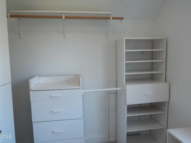 a backyard of a house with outdoor seating