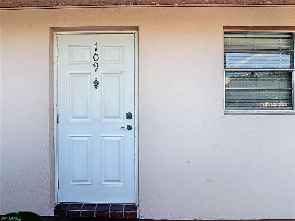 200 Turtle Lake Court, Unit 109 Naples, FL 34105 - Photo 3 of 37 a view of front door
