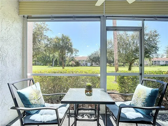 a view of an outdoor space with furniture and outside view