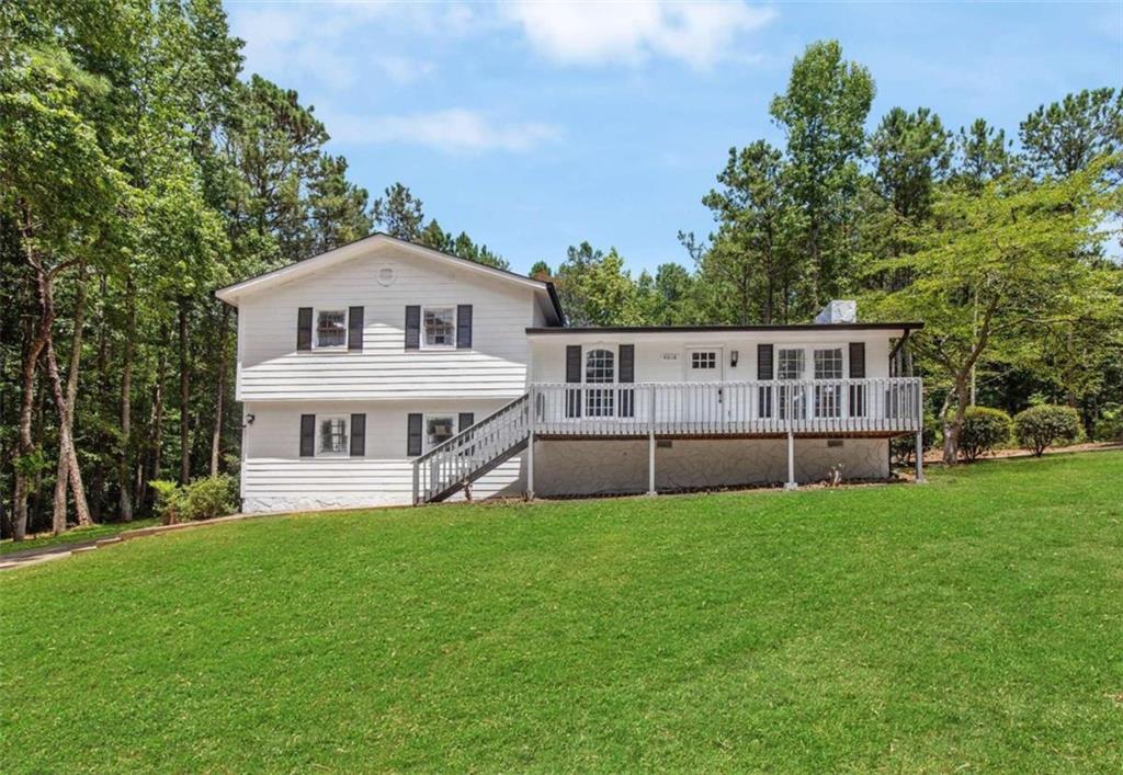 4018 Golfview Drive Villa Rica, GA 30180 - Photo 1 of 1 a view of a house with a yard
