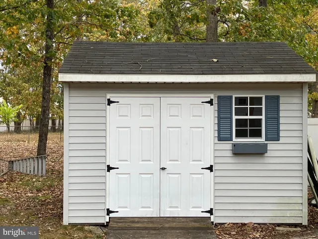 a view of outdoor space with trees all around
