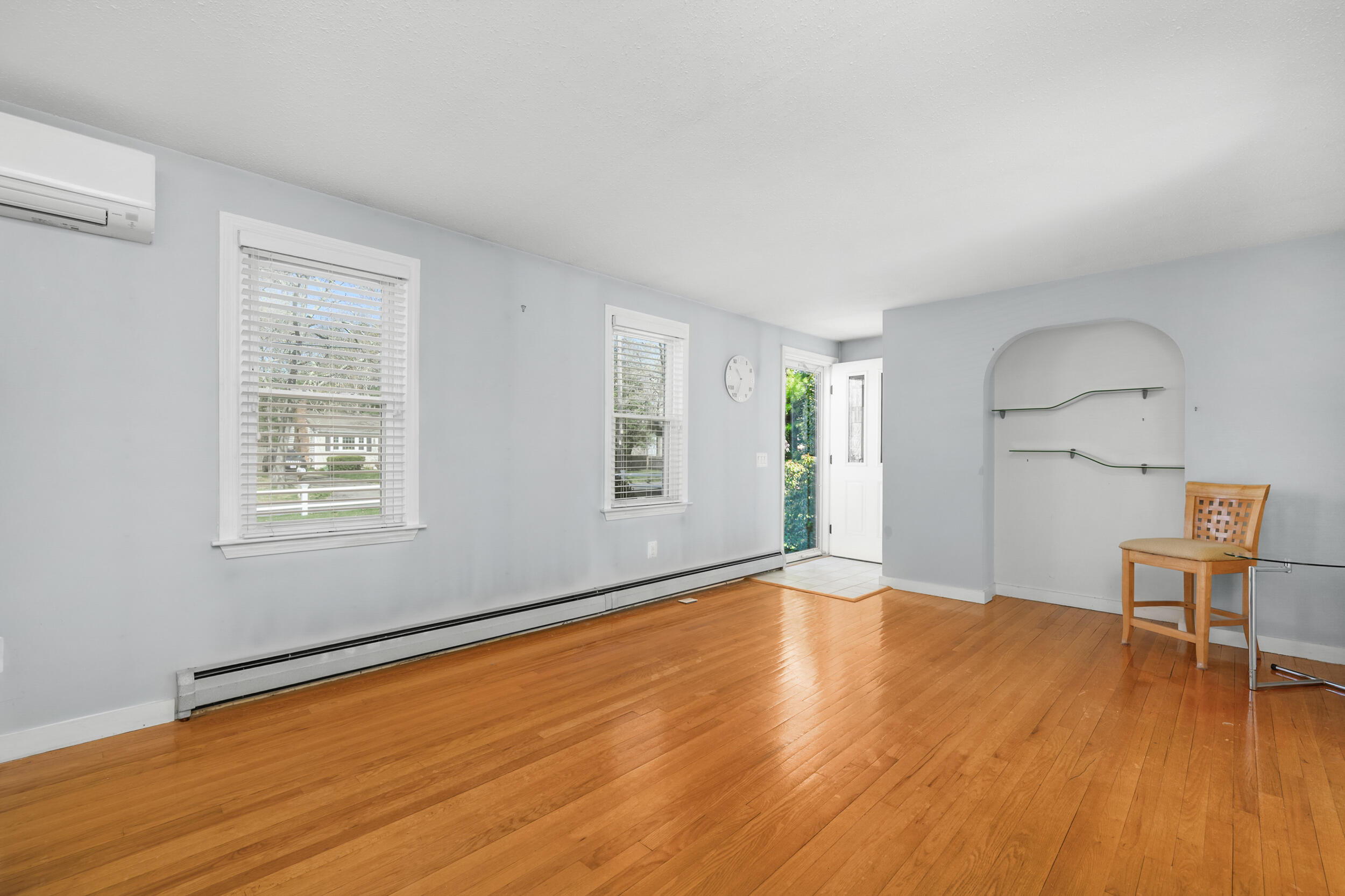 136 Sheaffer Road Centerville, MA 02632 - Photo 12 of 44 a view of empty room with wooden floor and fan