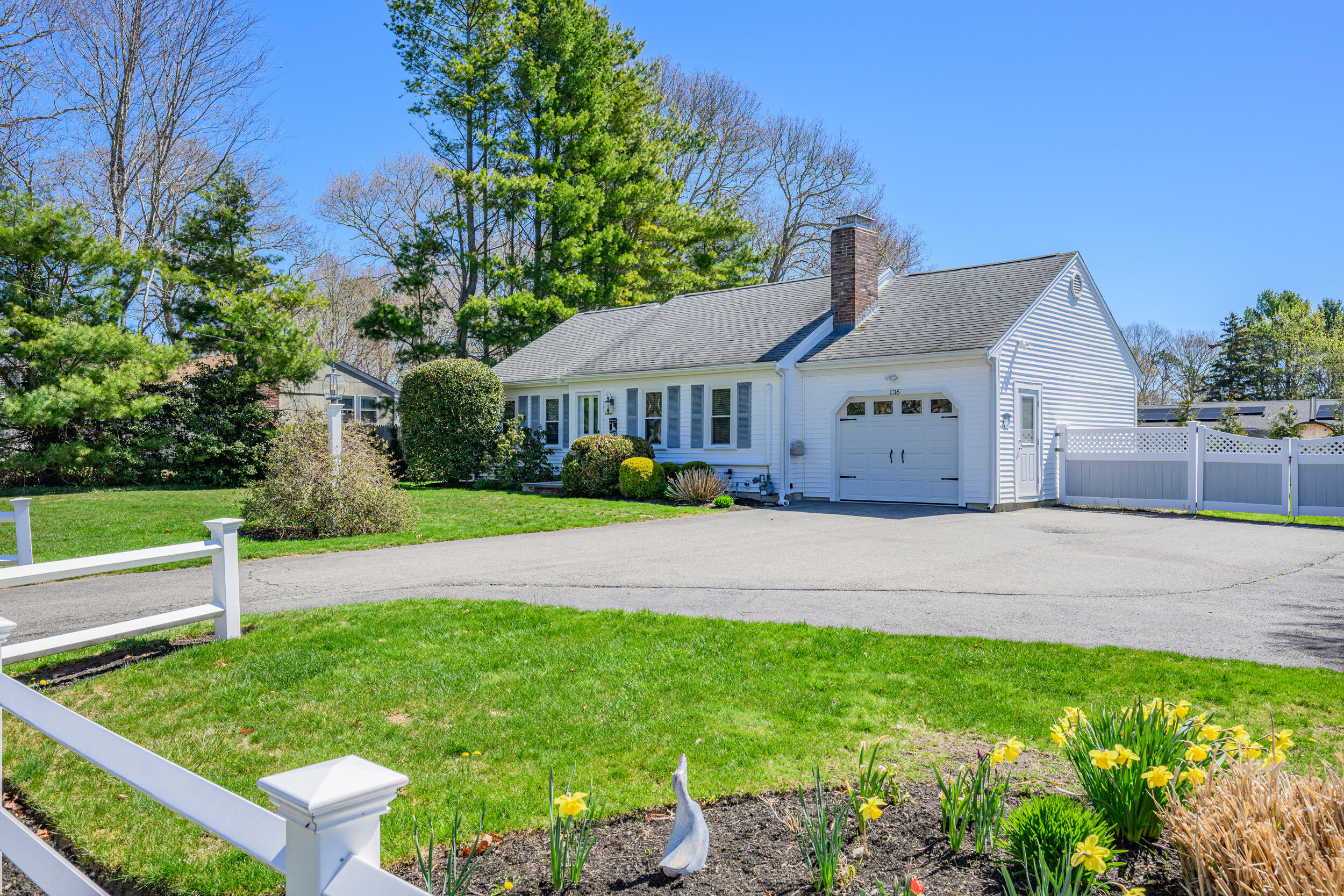 136 Sheaffer Road Centerville, MA 02632 - Photo 3 of 44 a front view of house with yard and green space