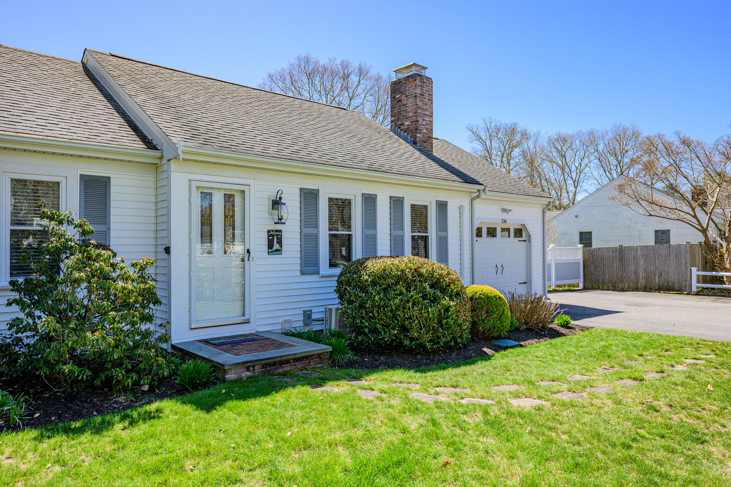 136 Sheaffer Road Centerville, MA 02632 - Photo 4 of 44 a view of a house with a big yard and potted plants