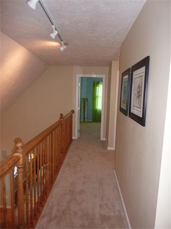 8 Nehemiah Road Shirley, MA 01464 - Photo 16 of 19 a view of a hallway with windows