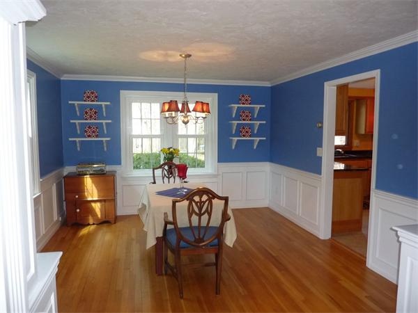 8 Nehemiah Road Shirley, MA 01464 - Photo 10 of 19 a dining room with furniture a chandelier and wooden floor