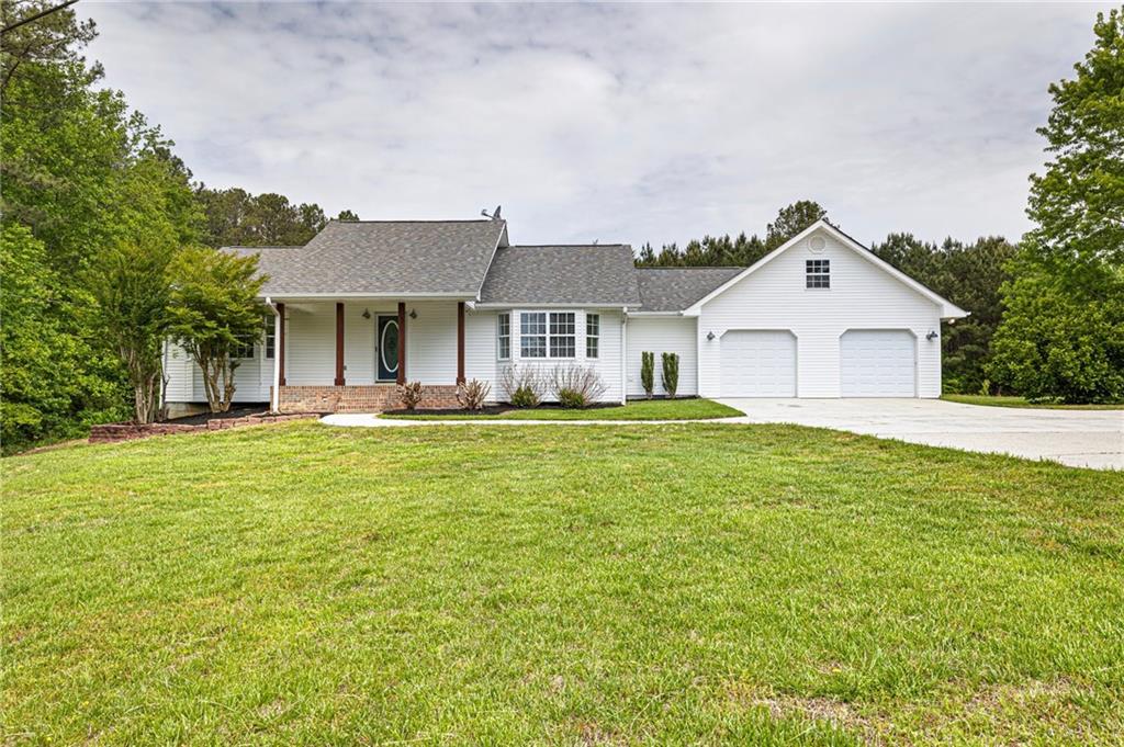 188 Spiva Road Temple, GA 30179 - Photo 1 of 1 a front view of house with yard and green space