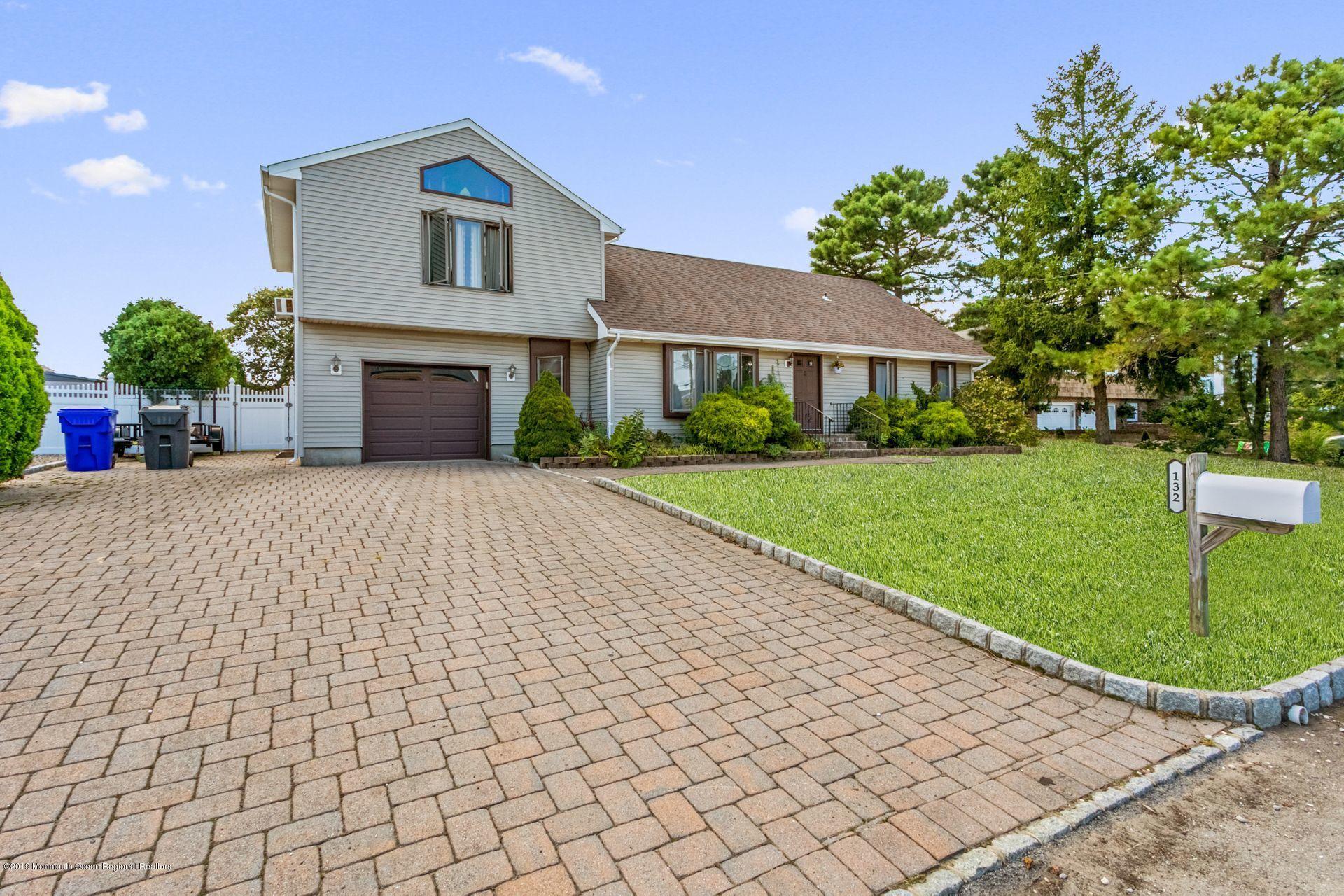 132 Mizzen Road Brick, NJ 08723 - Photo 1 of 41 a view of a yard in front of a house