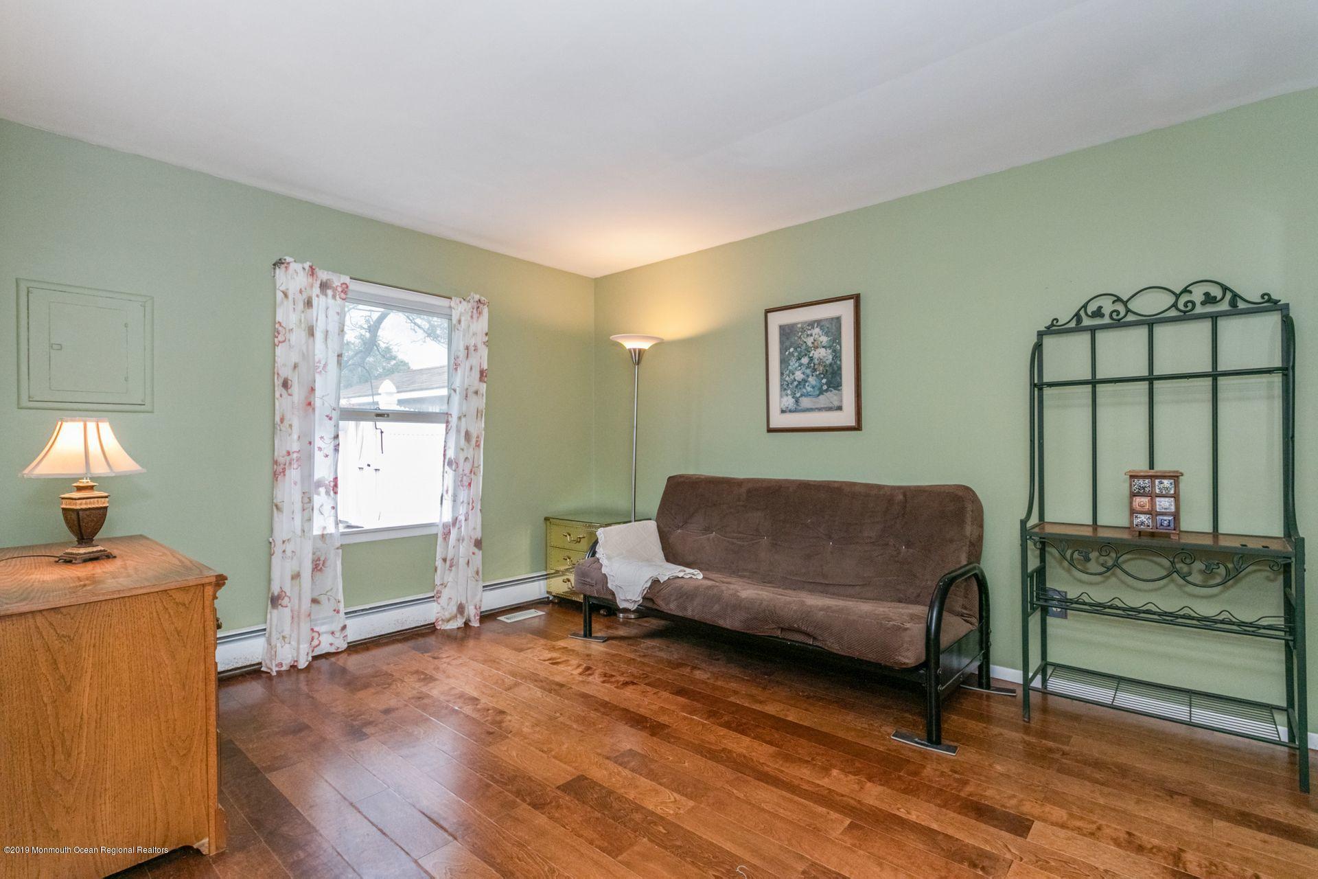 132 Mizzen Road Brick, NJ 08723 - Photo 17 of 41 a living room with furniture and a window