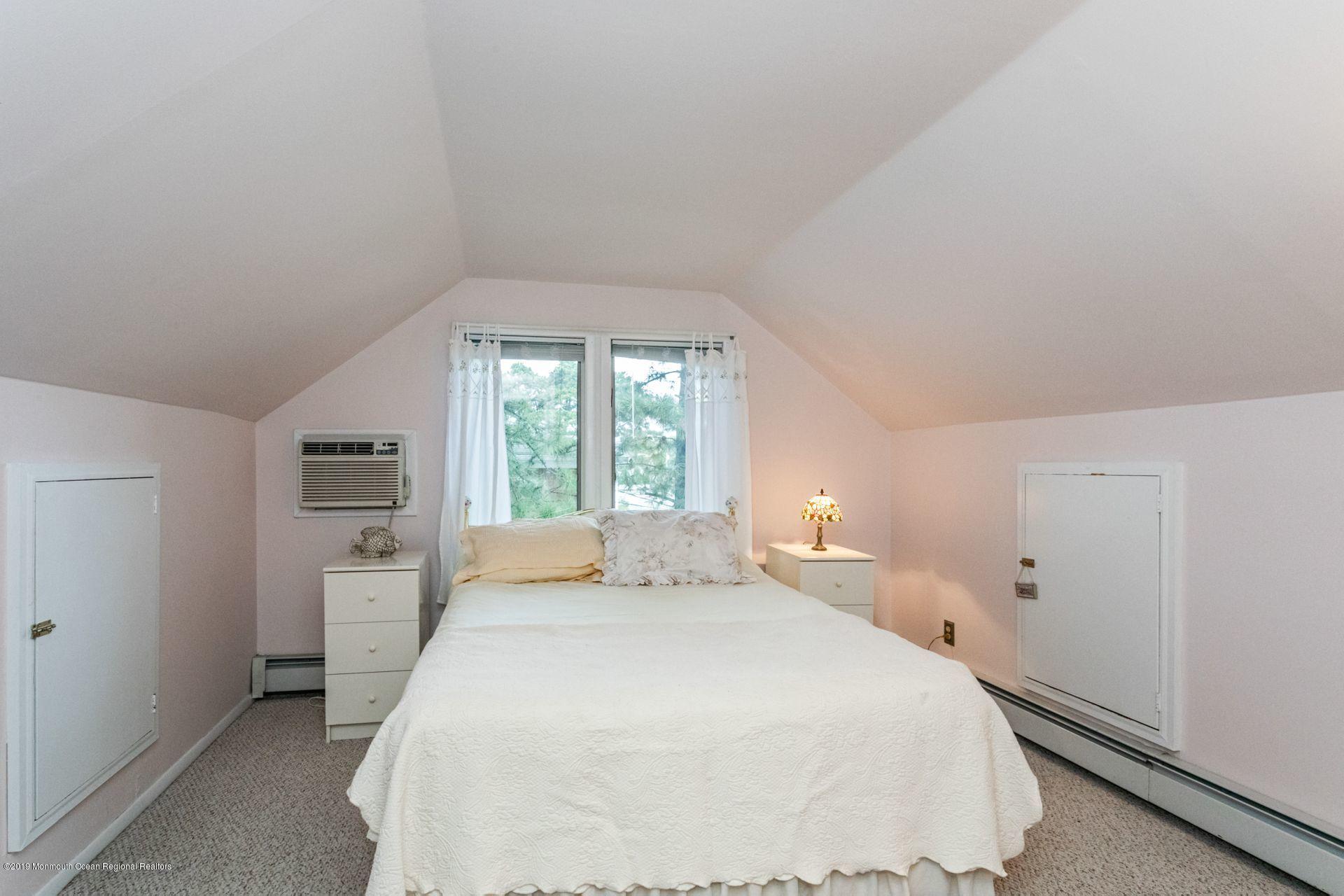 132 Mizzen Road Brick, NJ 08723 - Photo 19 of 41 a spacious bedroom with a bed and a large window