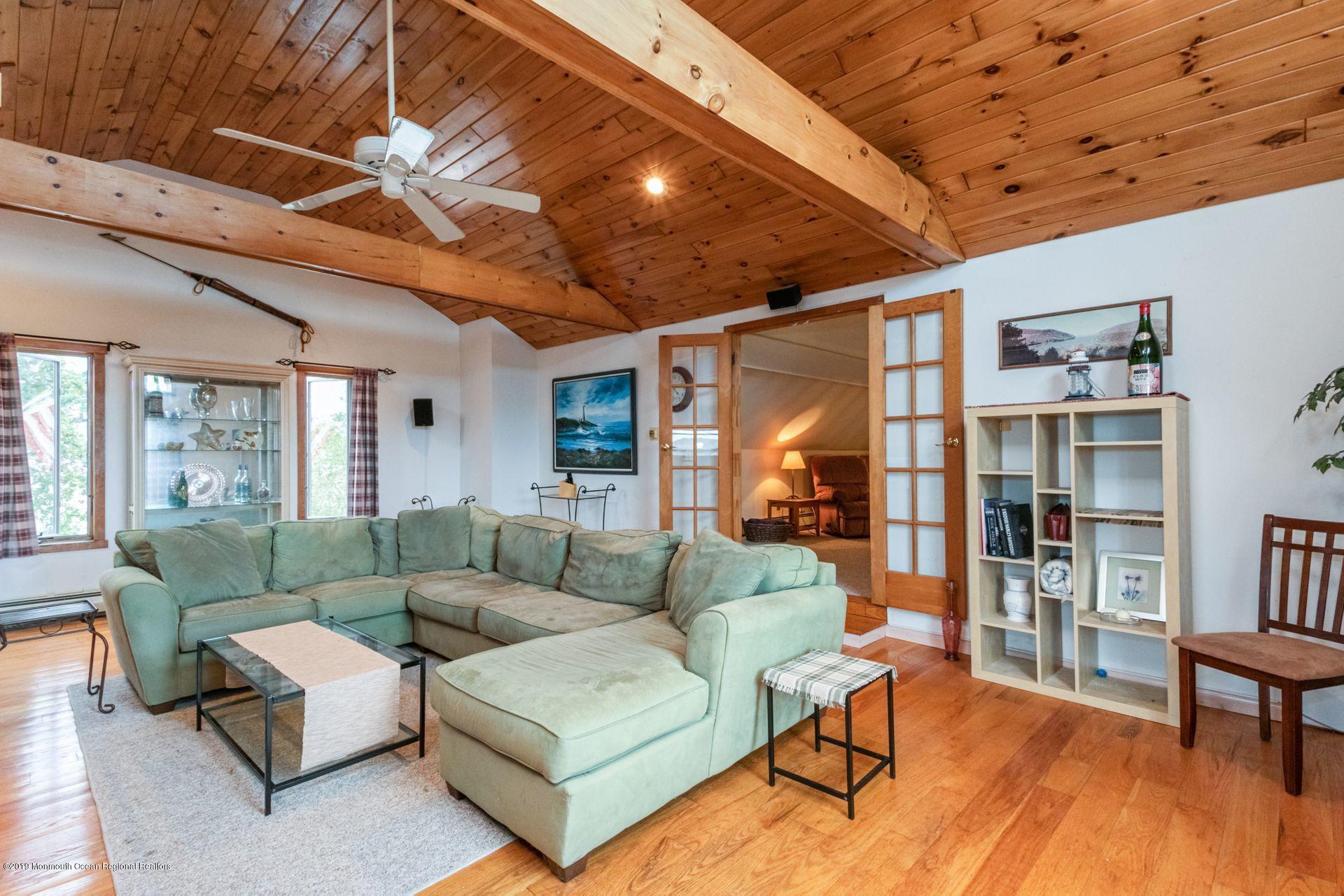 132 Mizzen Road Brick, NJ 08723 - Photo 24 of 41 a living room with furniture and wooden floor