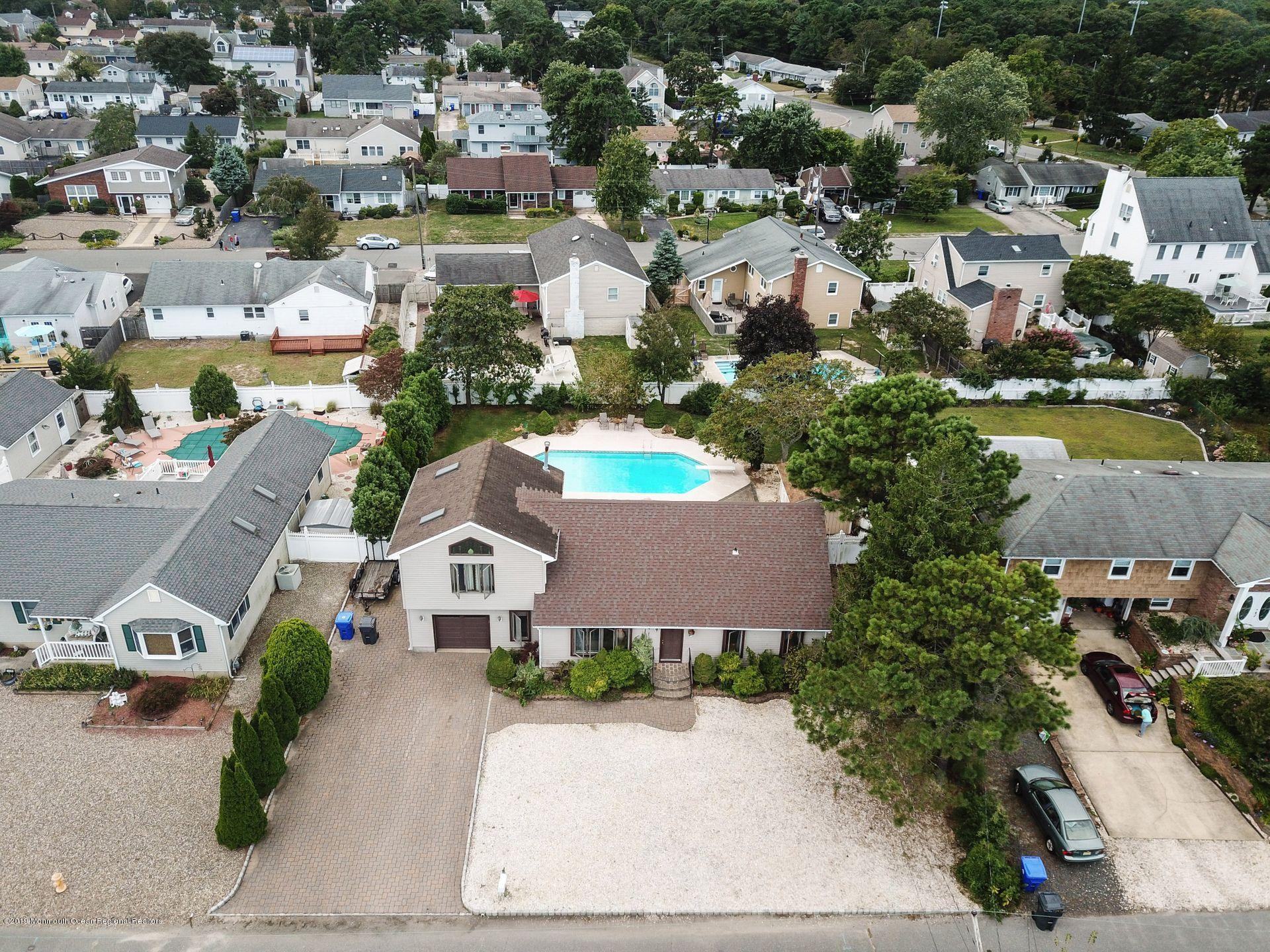 132 Mizzen Road Brick, NJ 08723 - Photo 30 of 41 an aerial view of residential houses with outdoor space