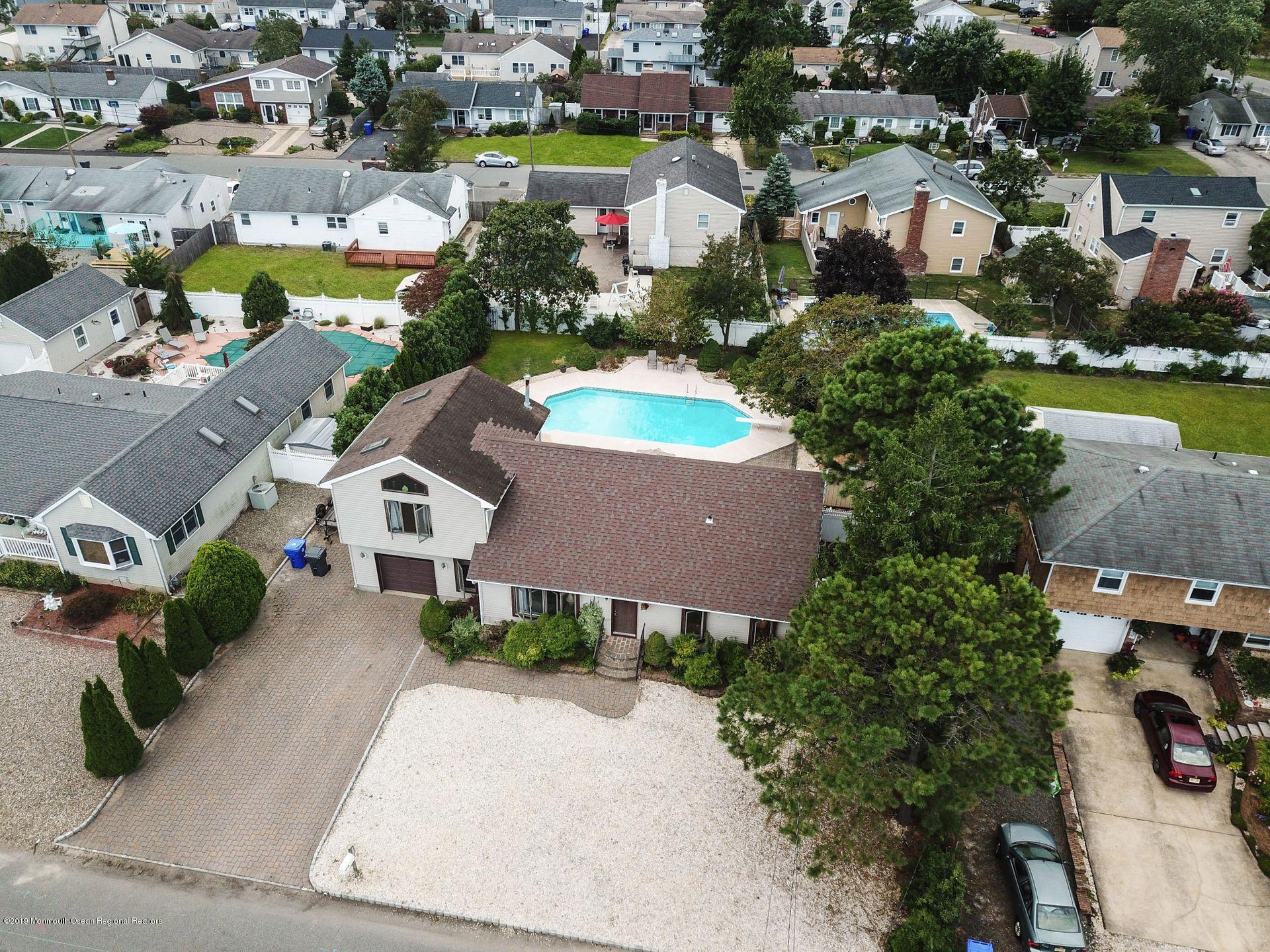 132 Mizzen Road Brick, NJ 08723 - Photo 31 of 41 an aerial view of a house with garden space and street view