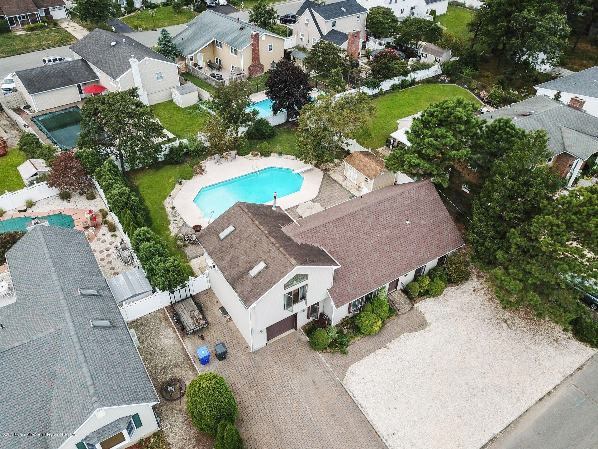 132 Mizzen Road Brick, NJ 08723 - Photo 33 of 41 an aerial view of residential house with outdoor space and swimming pool