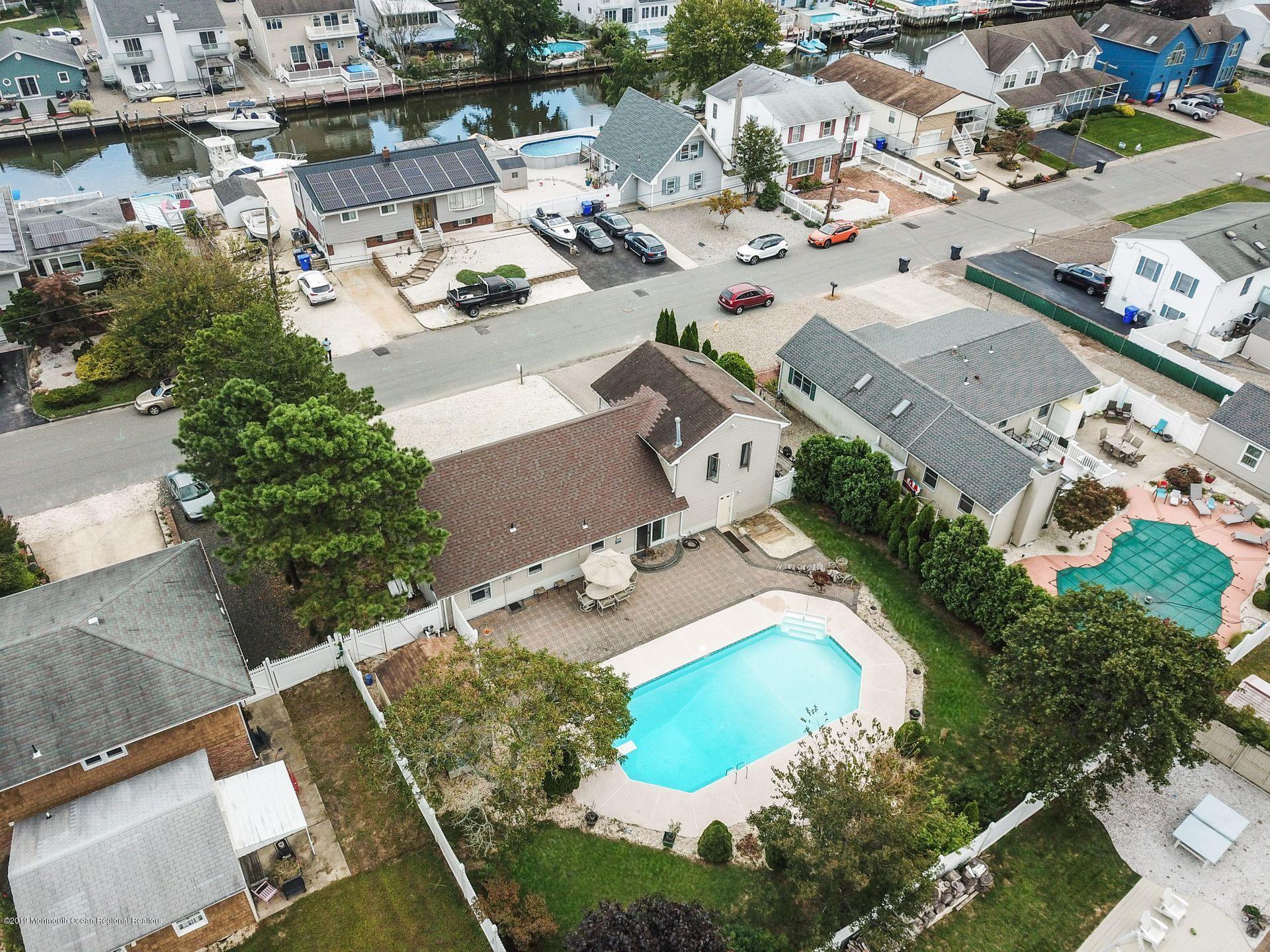 132 Mizzen Road Brick, NJ 08723 - Photo 34 of 41 an aerial view of residential houses with outdoor space