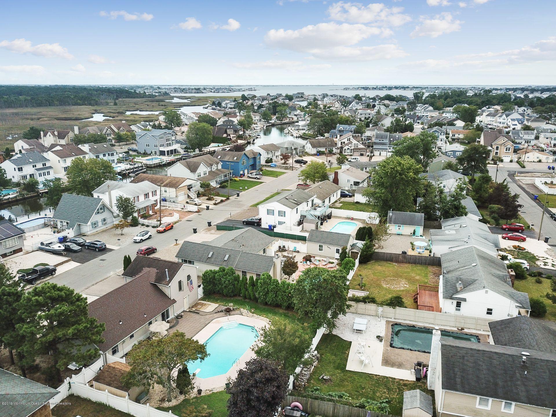 132 Mizzen Road Brick, NJ 08723 - Photo 38 of 41 an aerial view of a city with lots of residential buildings