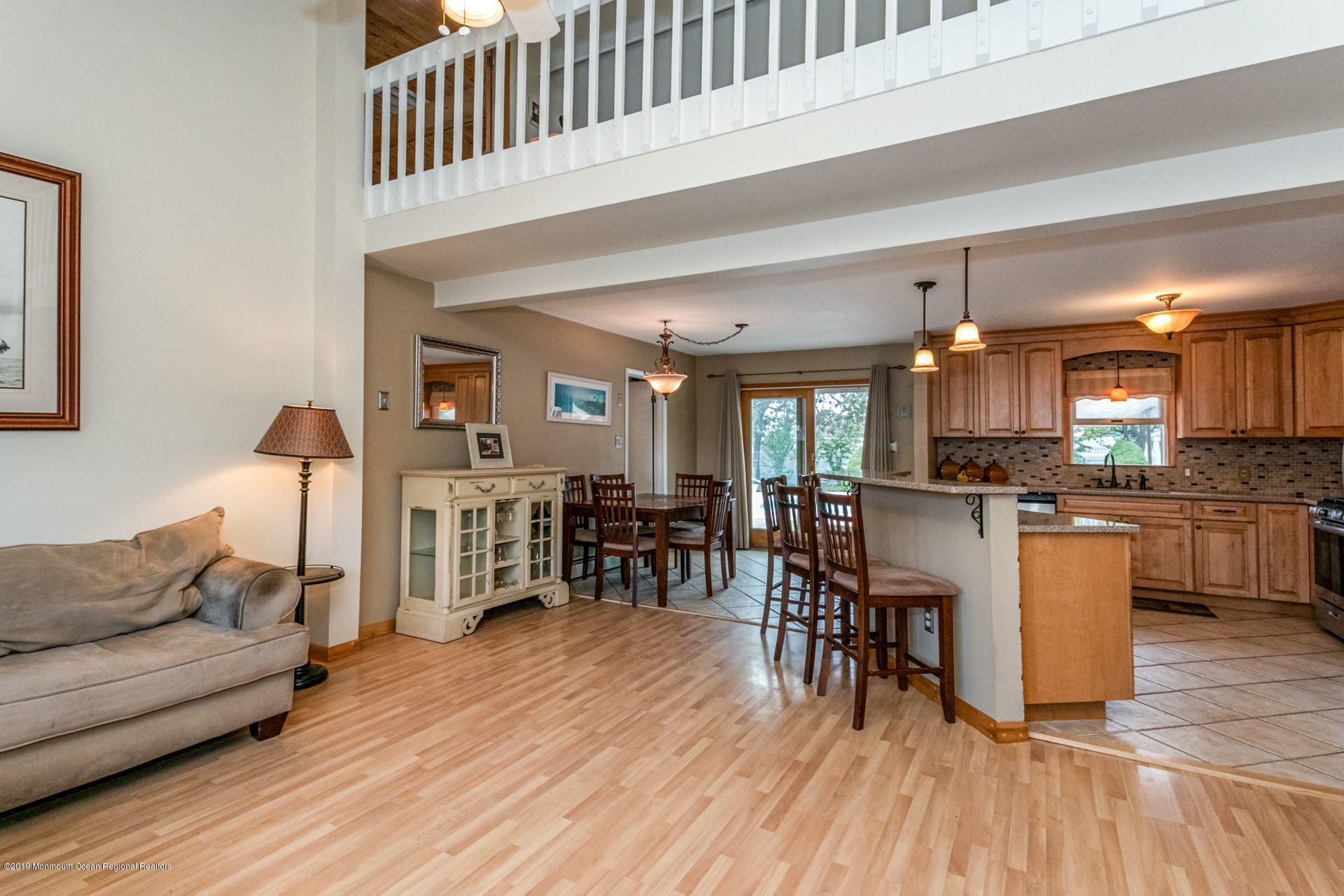 132 Mizzen Road Brick, NJ 08723 - Photo 6 of 41 a living room with furniture and kitchen view