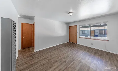 a kitchen with a refrigerator stove and sink