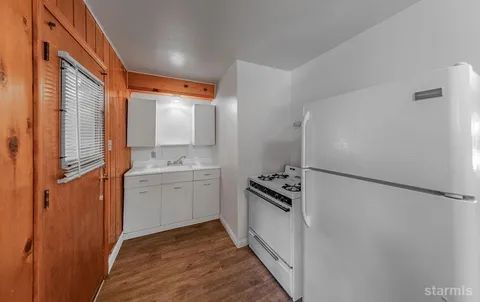 an empty room with closet area