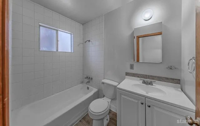 a view of a yard with car parked