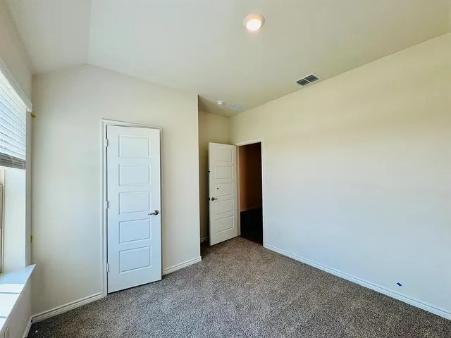 an empty room with closet