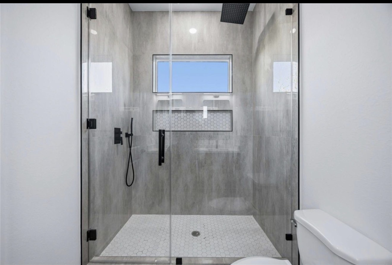 3923 Aledo Street, Unit B Houston, TX 77051 - Photo 9 of 12 a bathroom with a shower