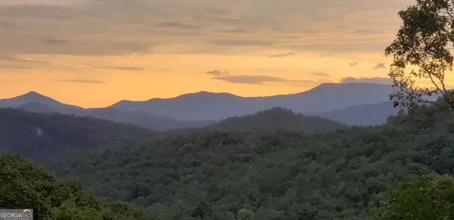 a view of a house with mountain view