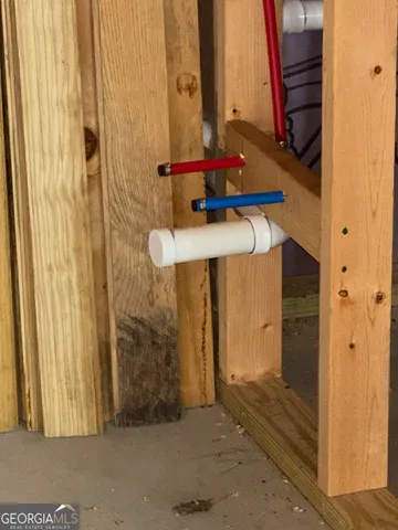 an aerial view of houses covered in trees
