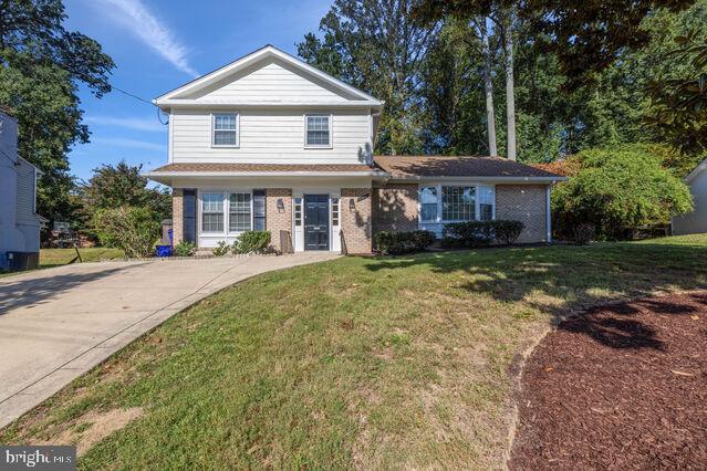 11810 Coldstream Drive Potomac, MD 20854 - Photo 1 of 30 a front view of a house with a yard