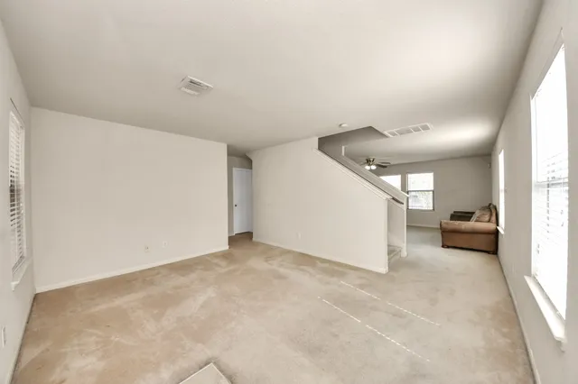 a view of a yard in front of a house