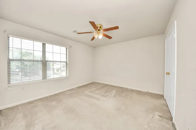 a bathroom with a sink toilet tub and shower