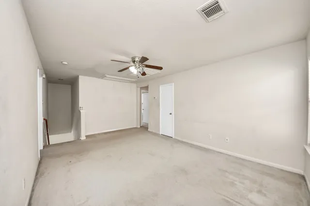 an aerial view of residential house with outdoor space and swimming pool